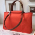 Hermes Cabag Elan Bag In Capucine Canvas